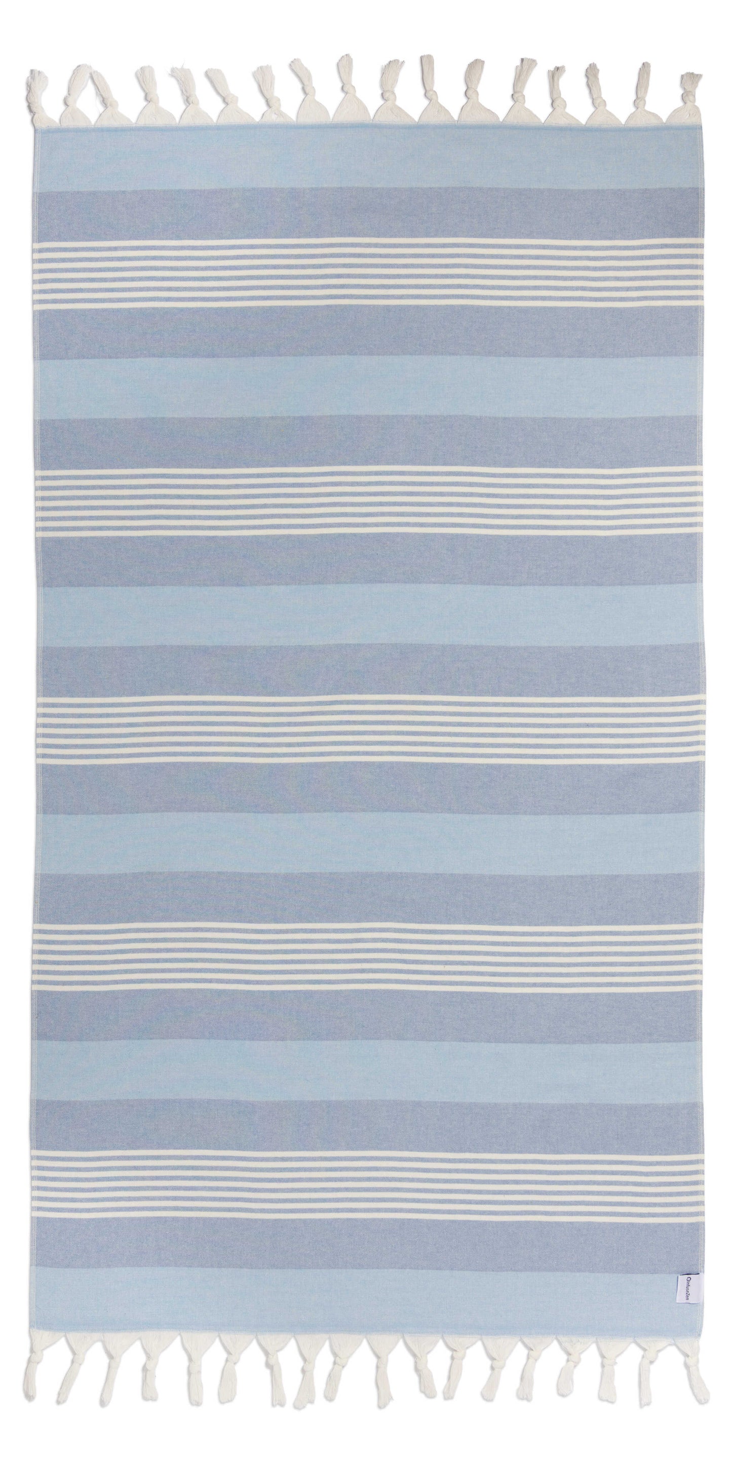Striped blue and white rug with tassels on a white background