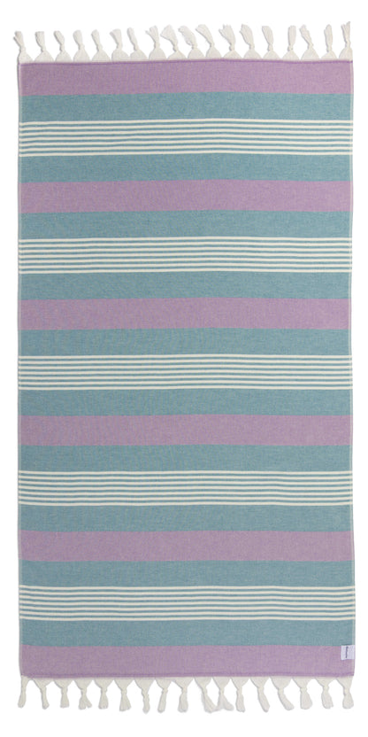 Striped towel with purple and blue horizontal stripes on a white background