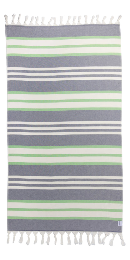 Striped towel with green, white, and blue stripes on a white background