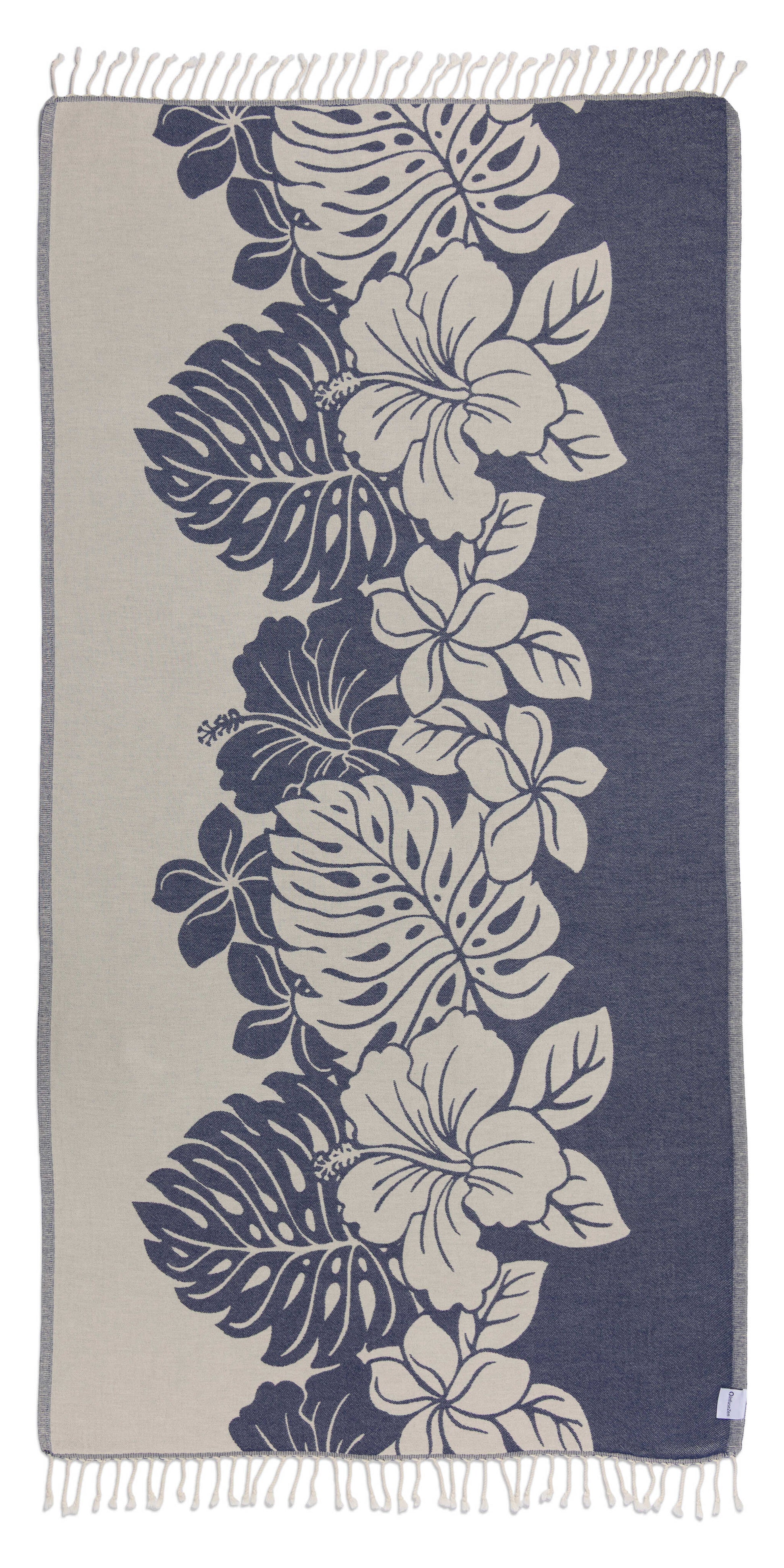 Towel with floral and leaf pattern on a blue background