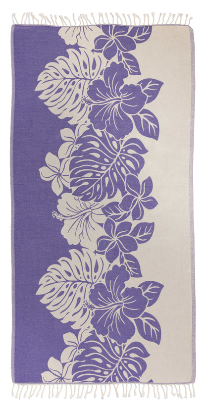 Towel with purple floral and leaf pattern on a white background