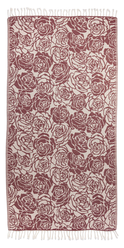 Towel with rose pattern in red and beige on a white background