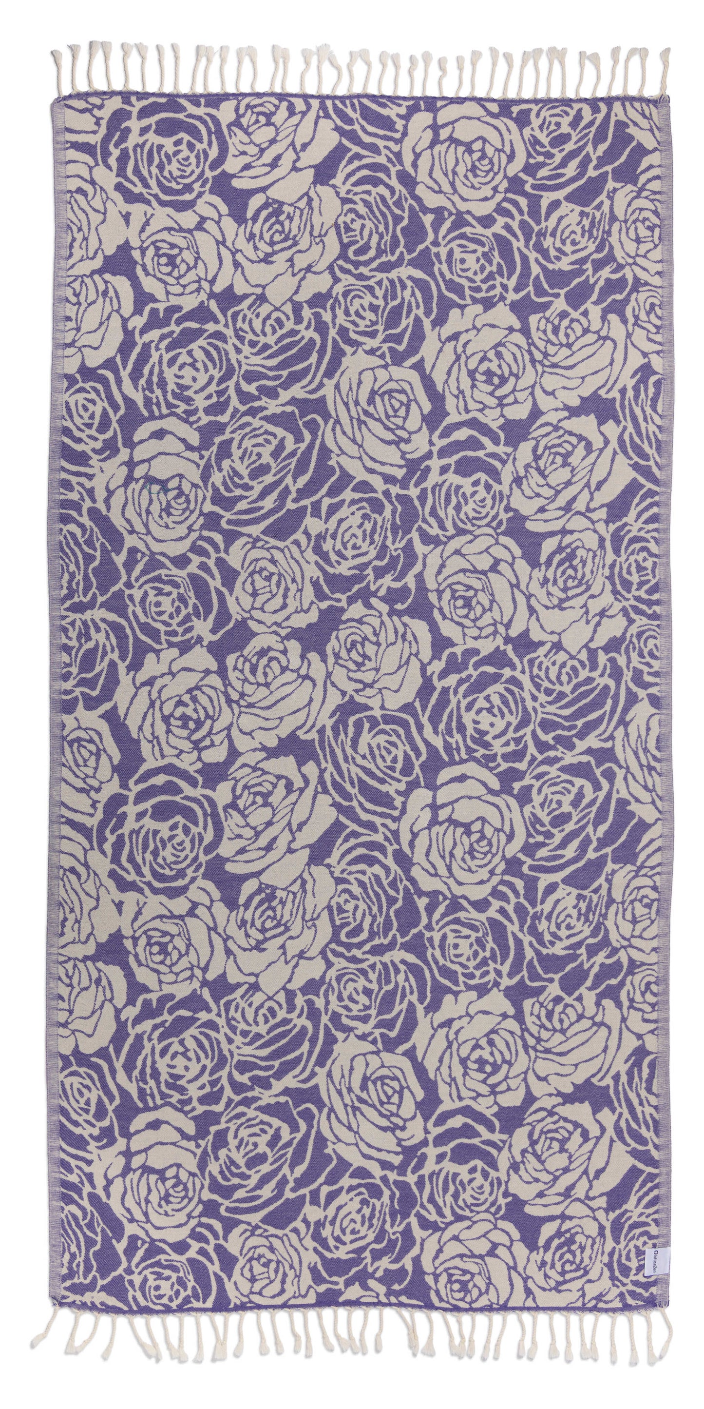 Purple towel with white rose pattern