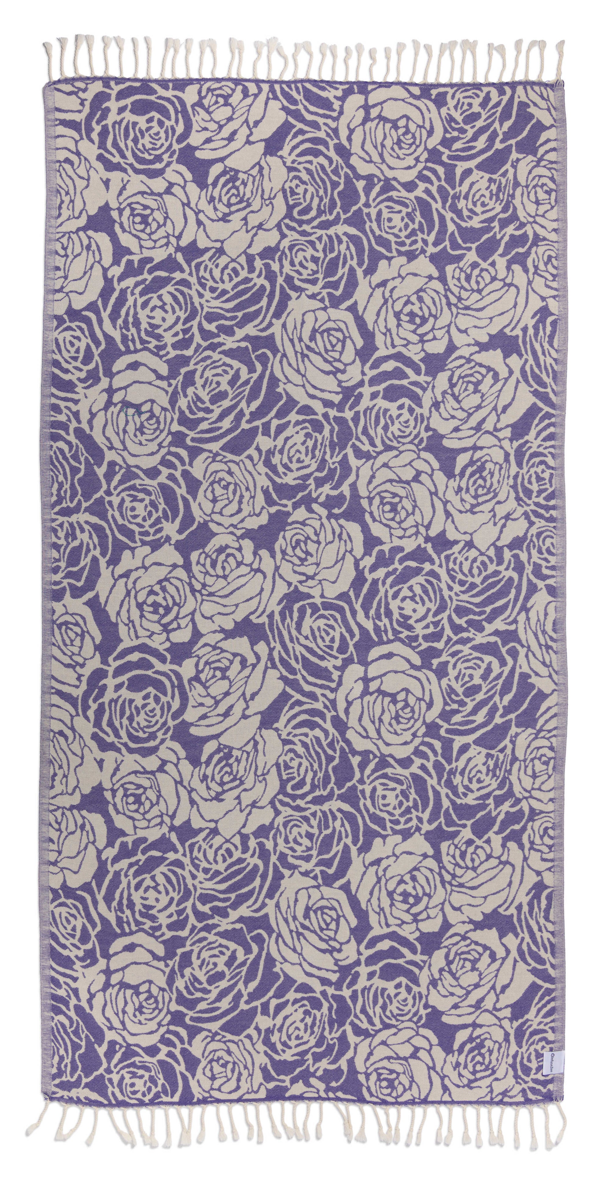 Purple towel with white rose pattern