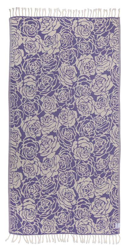 Purple towel with white rose pattern