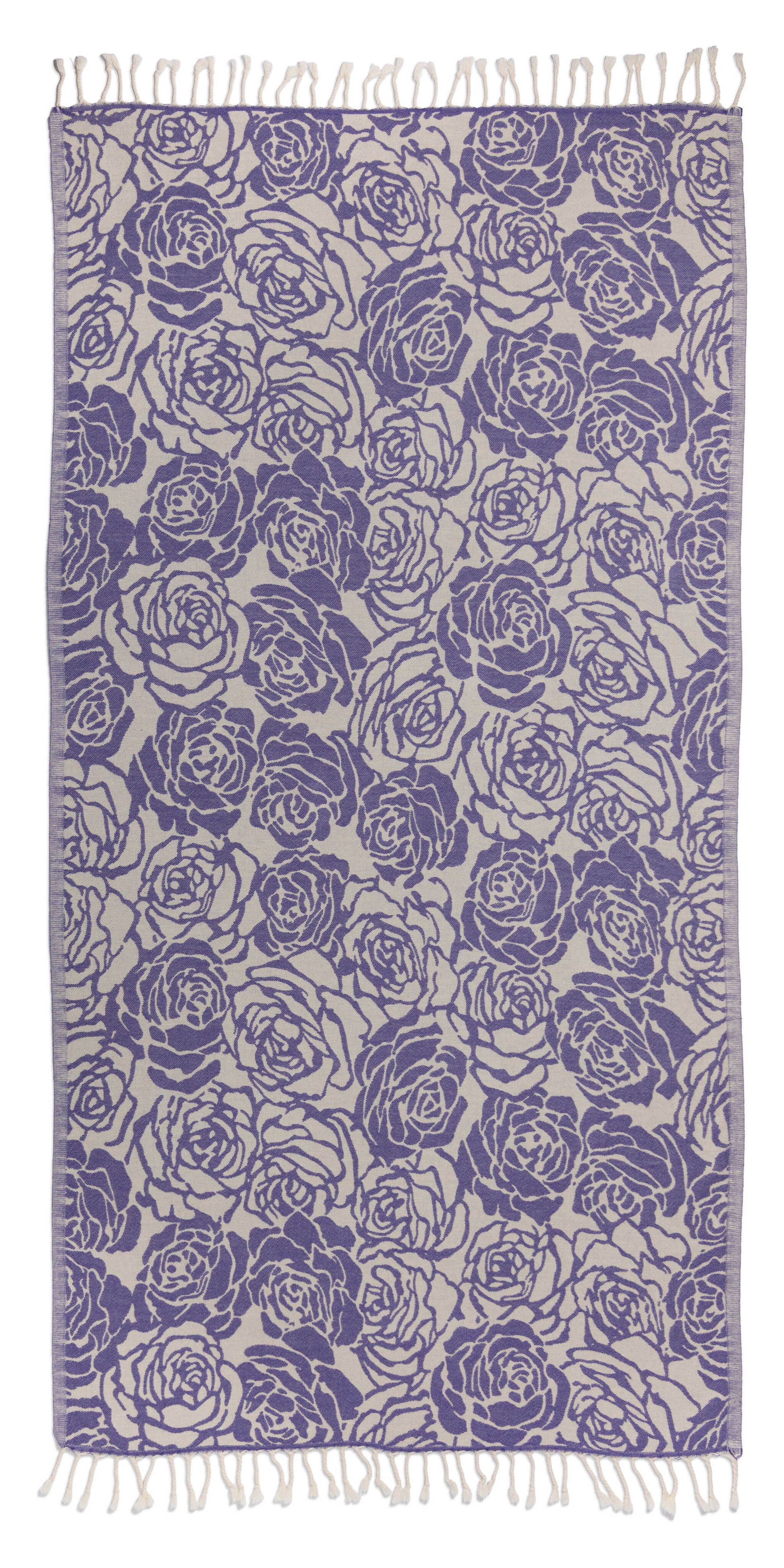 Patterned fabric with blue rose design on a white background