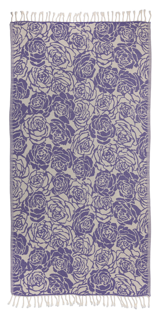 Patterned fabric with blue rose design on a white background
