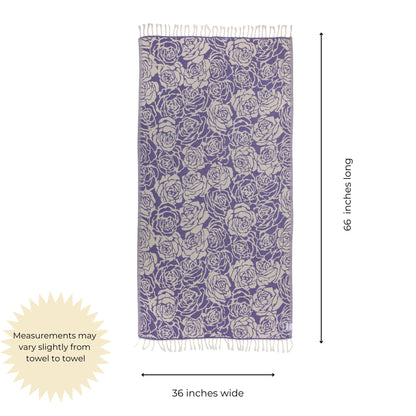 Purple and white patterned towel with measurements on a white background
